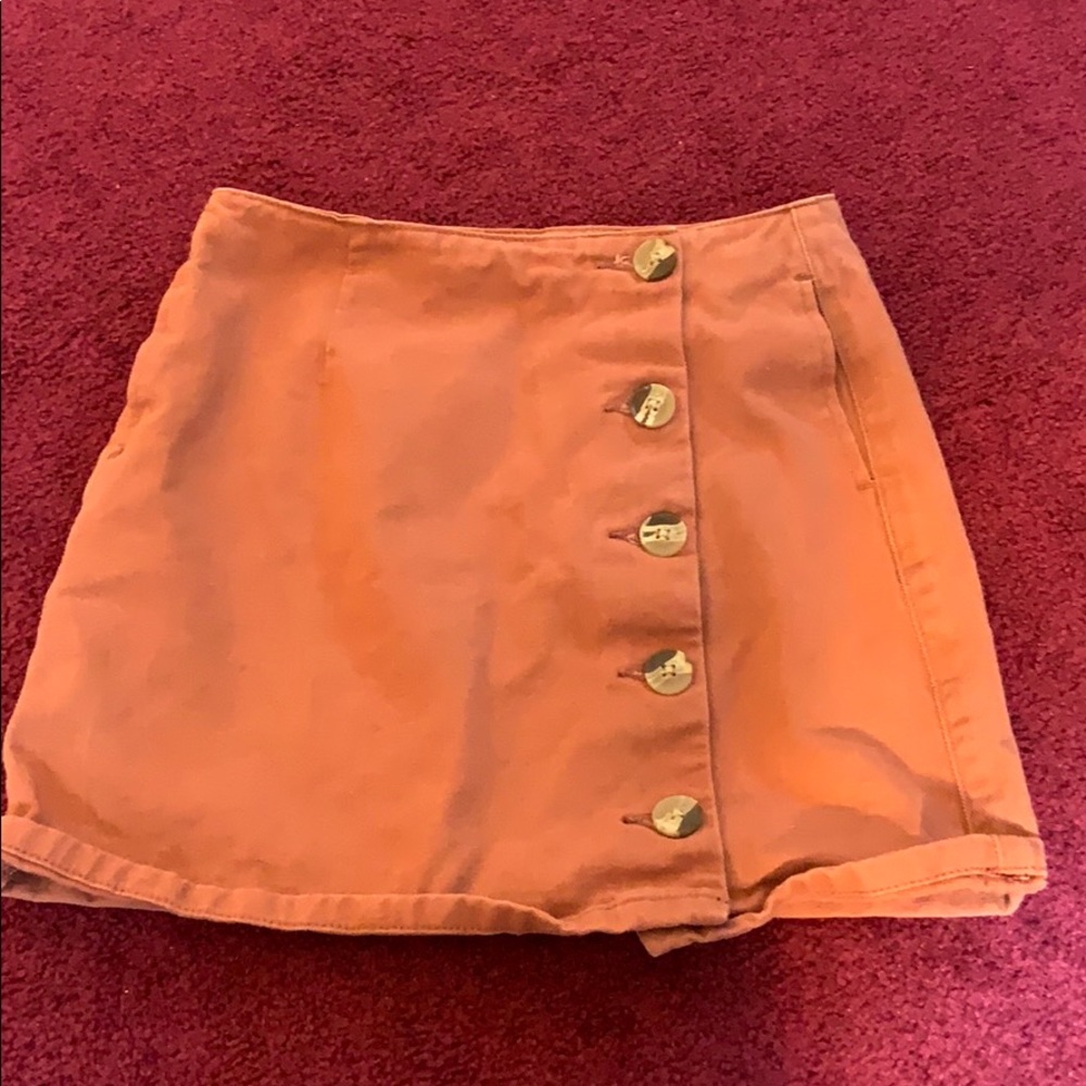 A blush colored skirt